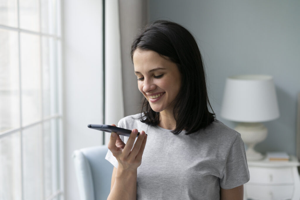 young-woman-holding-her-phone